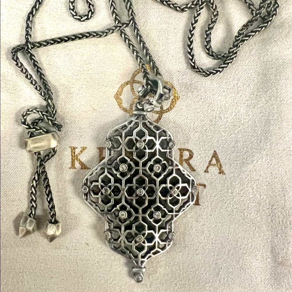 Long adjustable special edition piece. Brand new. Never worn.